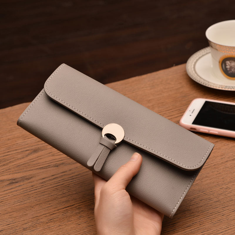 Three-fold buckle long wallet