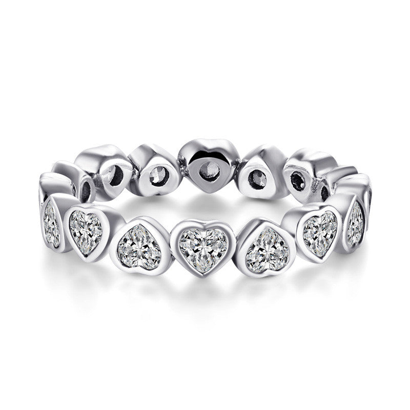 Anillo en forma de corazón con circonitas y diamantes de plata de ley