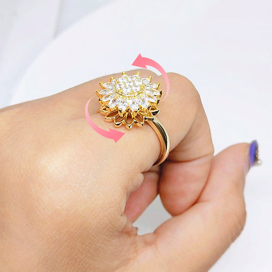 Anillo giratorio de girasol con diamantes completos