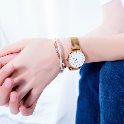 Pulseira feminina de aço titânio com algarismos romanos banhada a ouro rosa