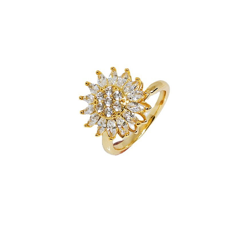 Anillo giratorio de girasol con diamantes completos